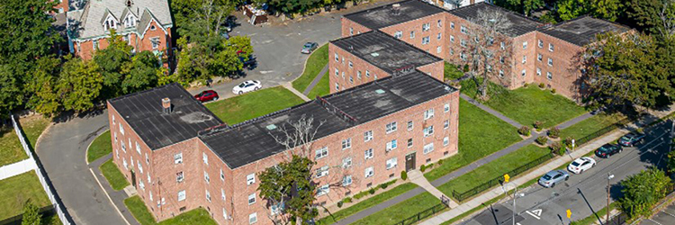 Pappas and Pinto of Chozick Realty Inc. facilitates $12.925 million sale of 176 apartment units across eight buildings in Hartford, CT